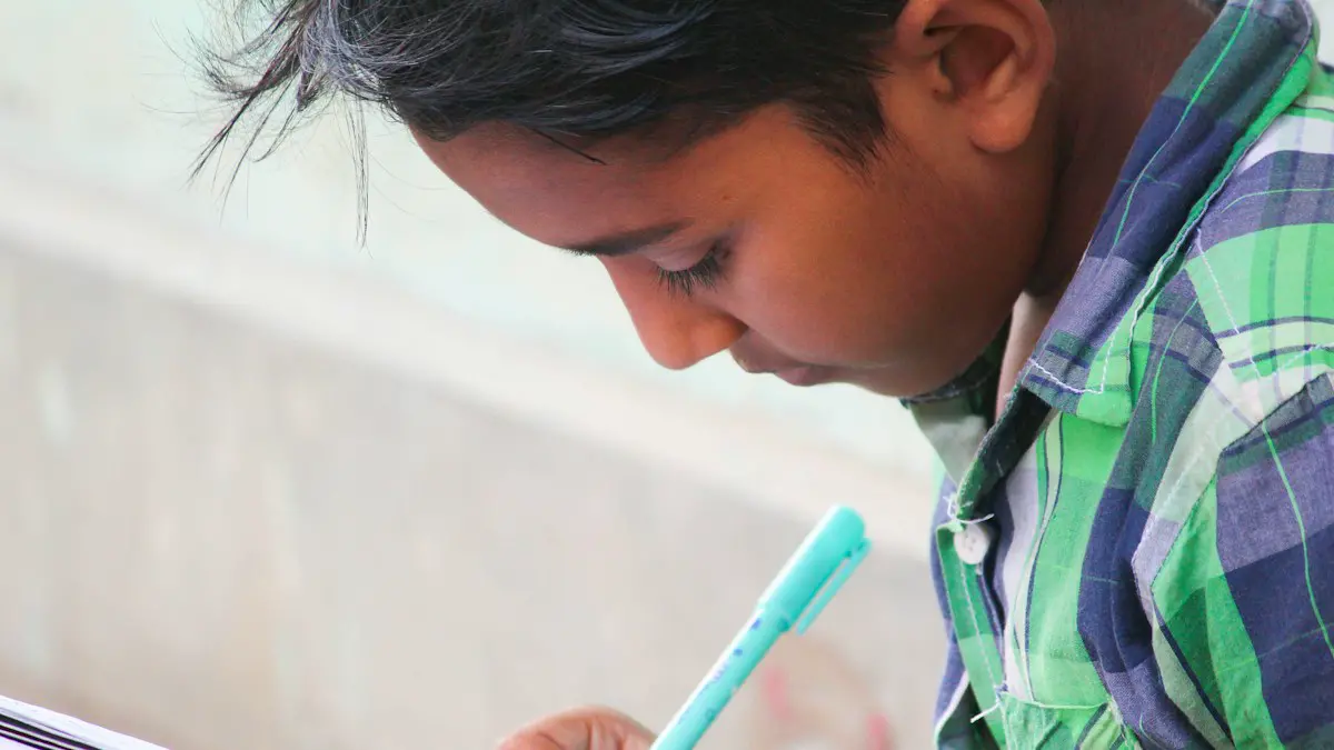 A young man using a tablet.