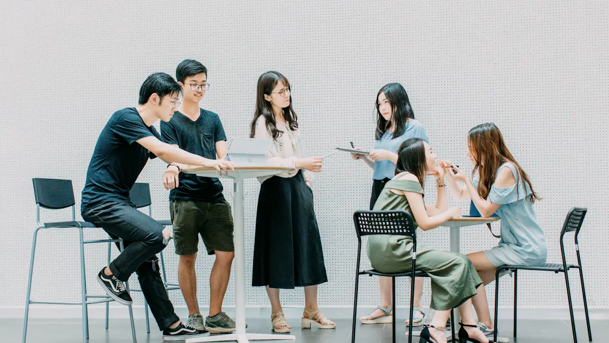Two men and four women meeting in office.