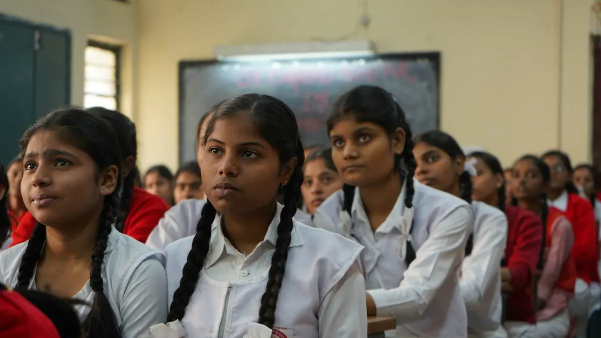 Girls in classroom.