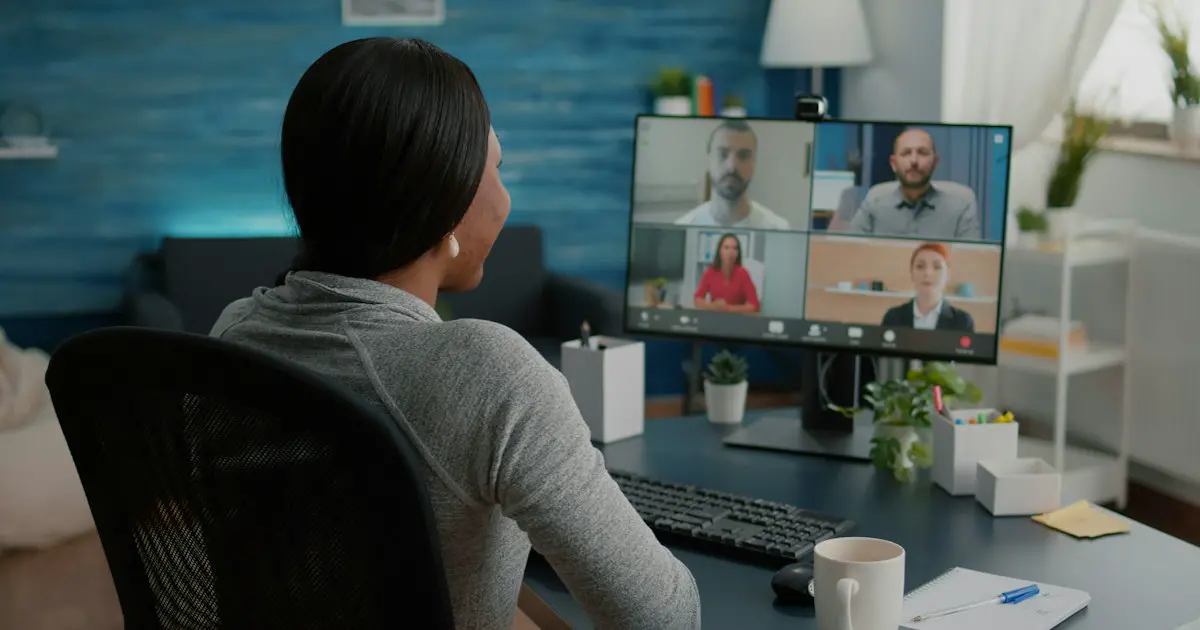 A candidate facing an interview panel on a video call.
