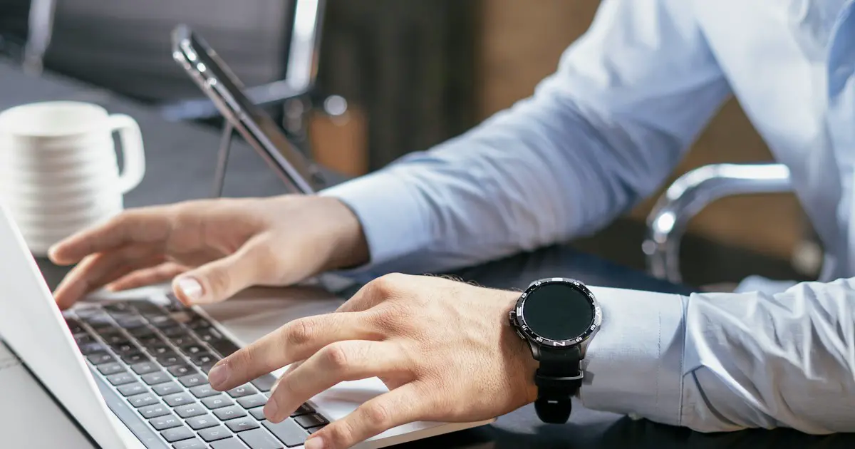 Filling in a job application on a laptop.