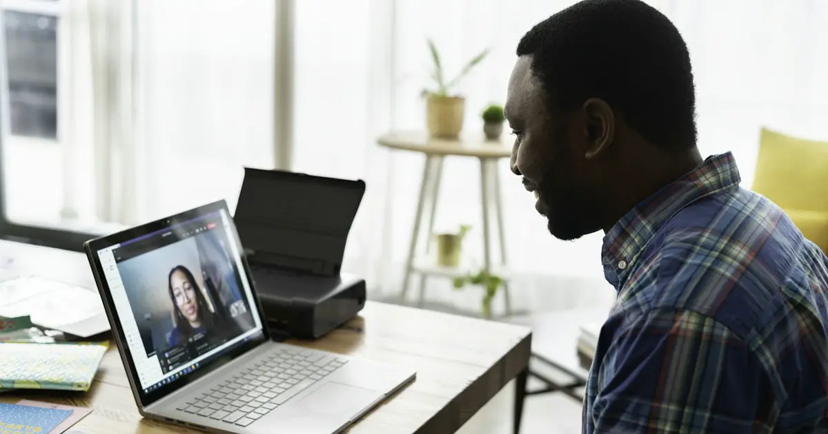 A candidate talking to an interviewer on a video call.