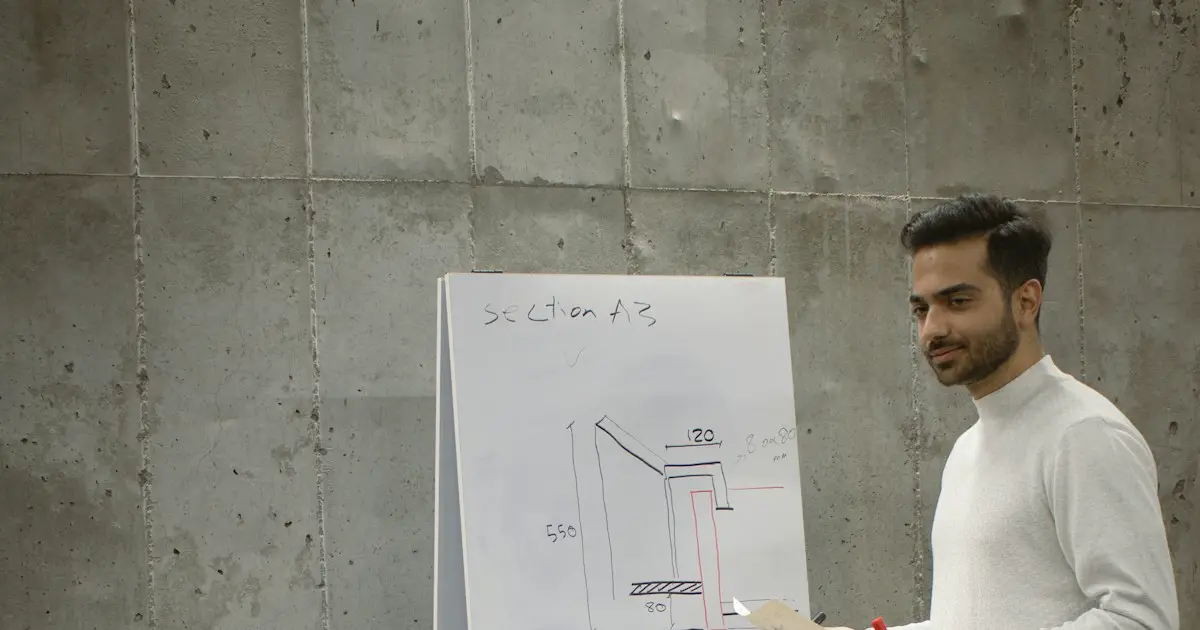 Explaining a project on a flip chart.