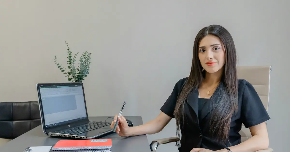 A candidate sitting upright and attentive at a desk.