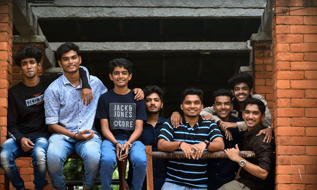 Final-year students talking together on a college campus.