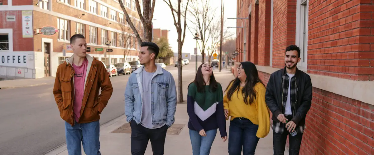 Final-year students on a college campus.